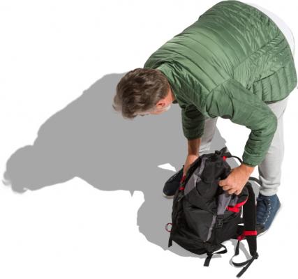 Standing Man With Black Backpack
