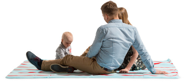 Sitting young family on blanket image