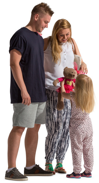Standing parents with small blonde daughter image