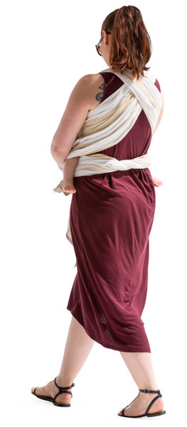 Walking mother with a baby in a sling image