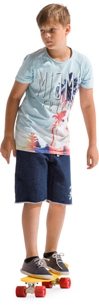 Young son on skateboard image