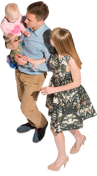 Father holding son and walking with mother image