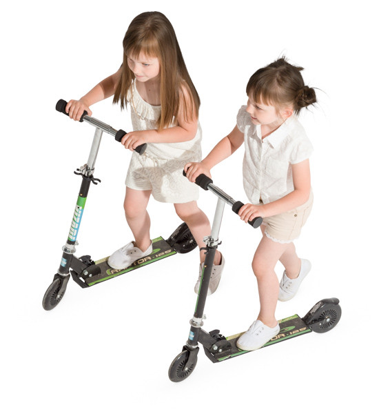 Two girls on scooters image