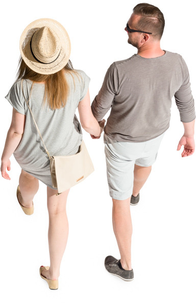 Walking young couple holding hands image