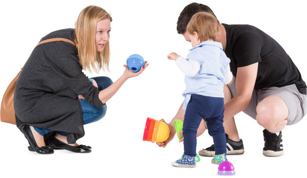 Parents playing with child image