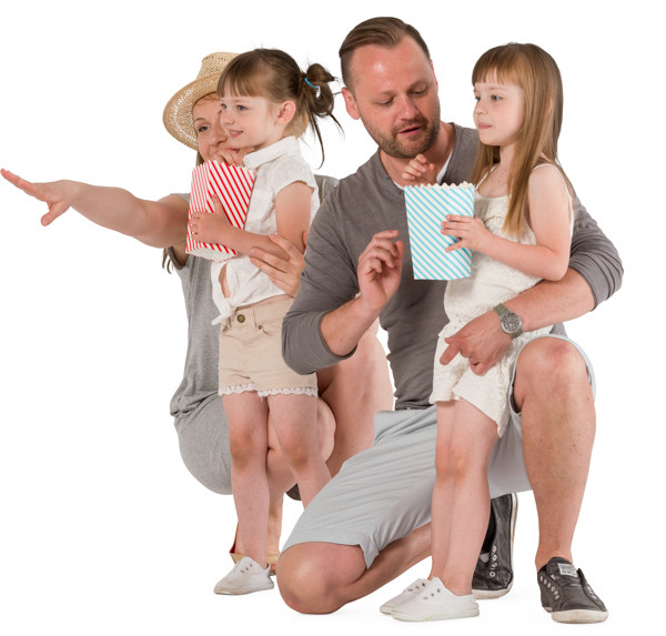 Young parents kneeling with children image