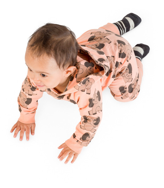 Small baby is crawling image