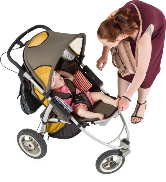 Mother leans over the pram image
