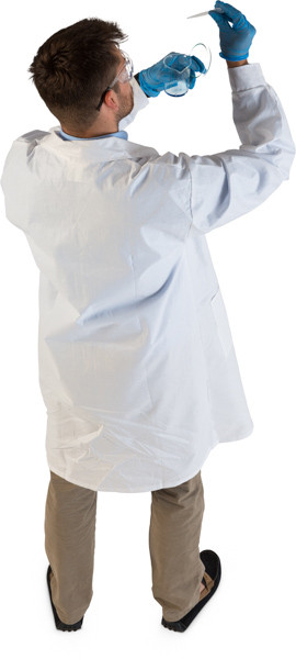 Standing scientist with glass beaker image