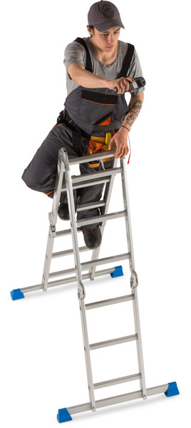 Worker standing on ladder image