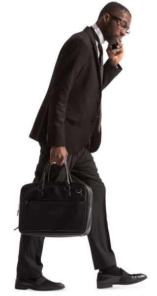 Walking businessman with briefcase image