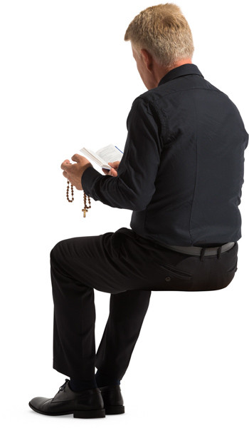 Sitting priest image