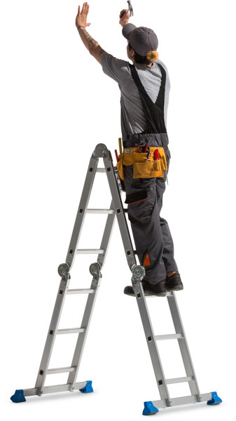 Worker standing on ladder image