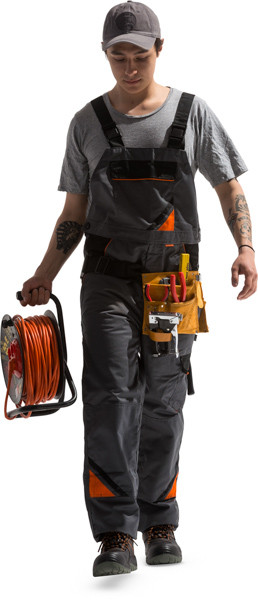 Worker walking with extension cord image