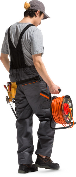 Worker walking with extension cord image