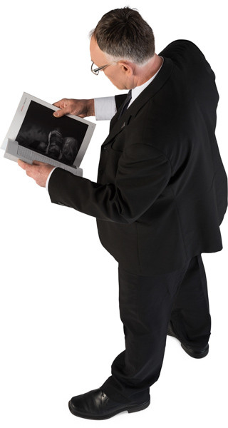 Standing man with book image