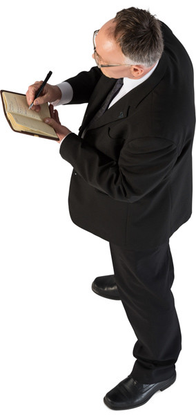 Standing man with notepad image