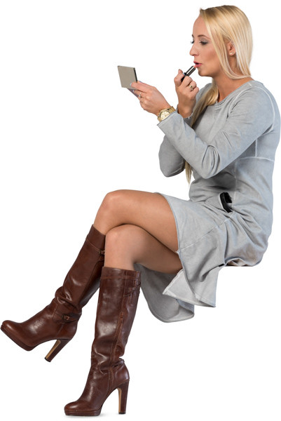 Sitting woman making makeup image