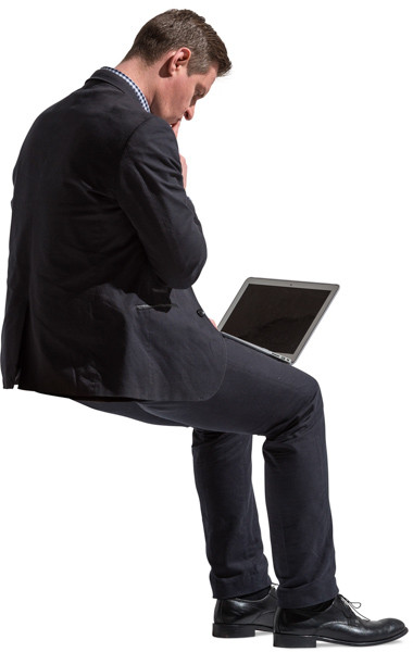Sitting man with laptop image