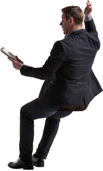 Sitting man with notepad image