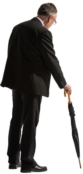 Standing man with umbrella image