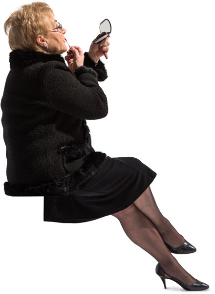 Sitting woman making makeup image