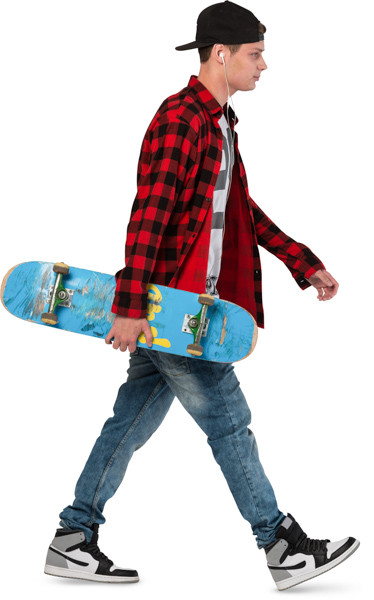 Walking boy with skateboard image