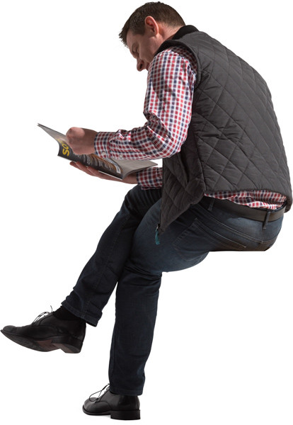 Sitting man with a magazine image