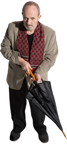 Standing man with umbrella image