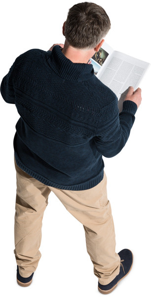 Standing man with a magazine image