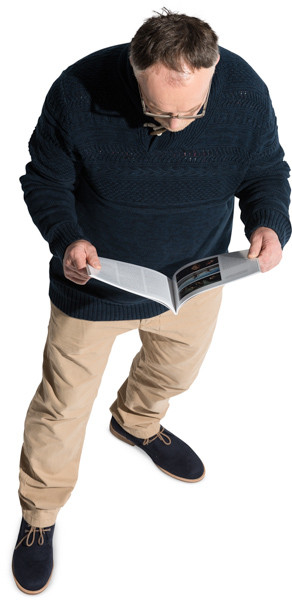 Standing man with a magazine image