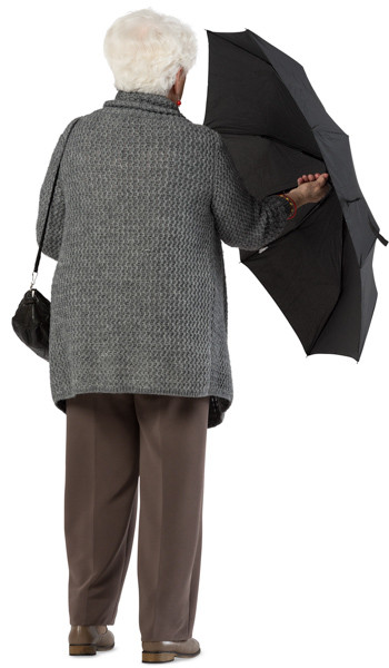 Standing woman with umbrella image