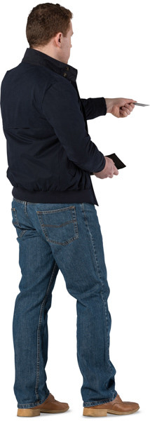 Standing man paying a card image