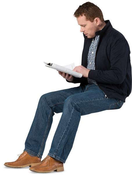 Sitting man with a magazine image