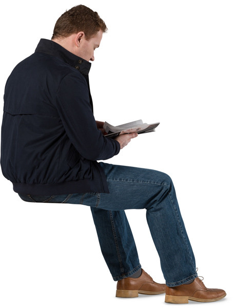 Sitting man with a magazine image