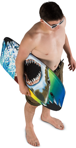 Standing boy with surfboard image
