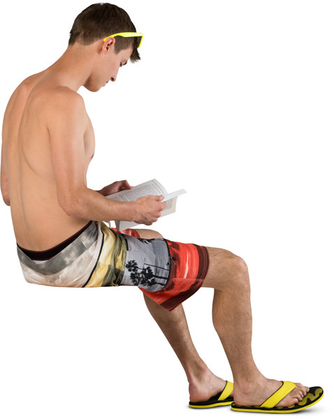 Sitting boy with a book image
