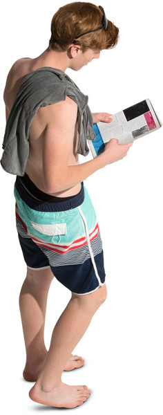 Standing boy with a magazine image