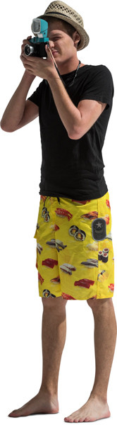 Standing boy taking picture image
