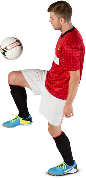 Football player kicking ball image