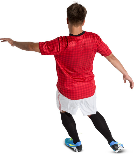 Kicking football player image