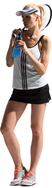 Standing tennis player drinking isotonic drink image