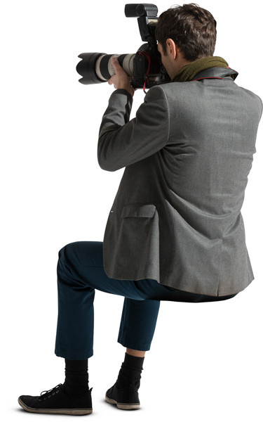 Sitting photographer taking photos image