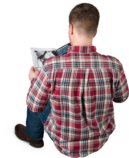 Sitting man with magazine image