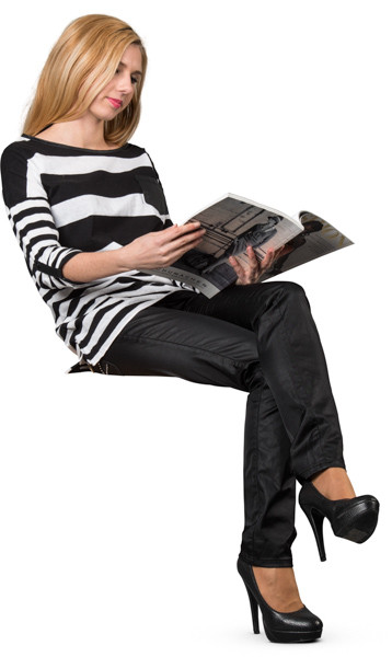 Sitting woman with magazine image