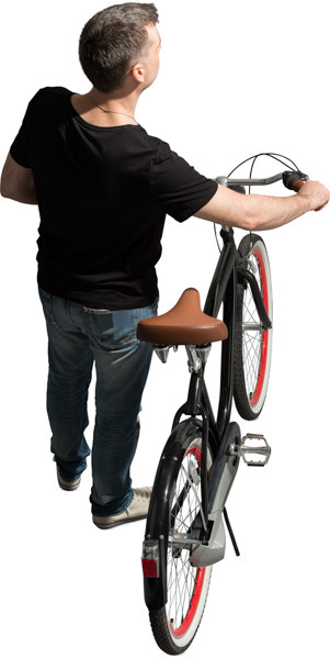 Man standing next to bike image