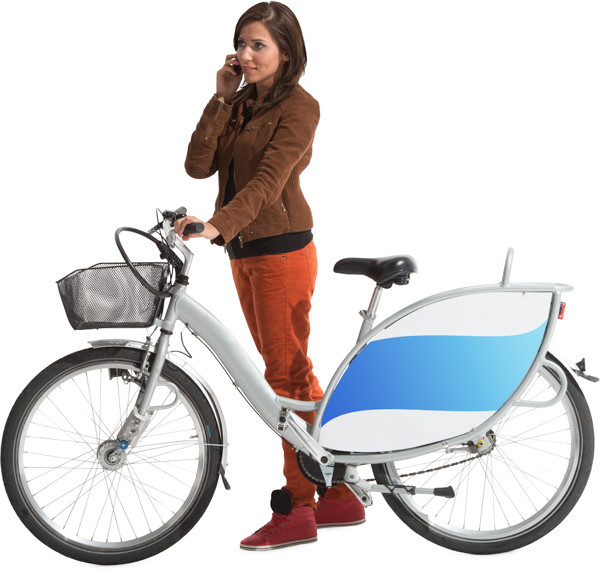 Woman standing next to bike image