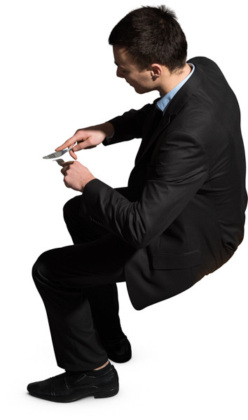 Sitting man eating meal image
