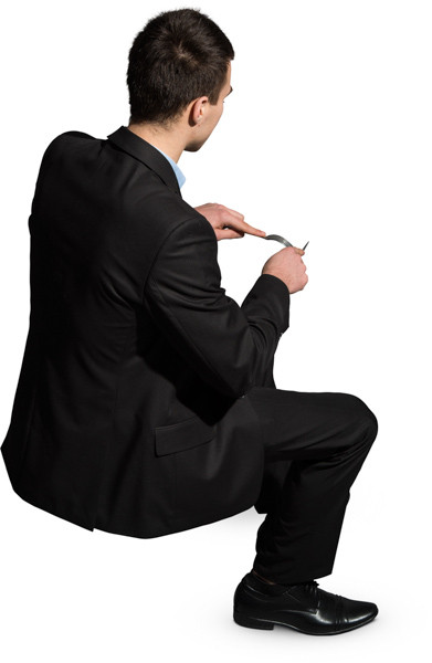Sitting man eating meal image