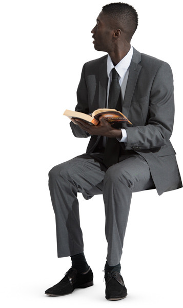 Sitting man with a book image
